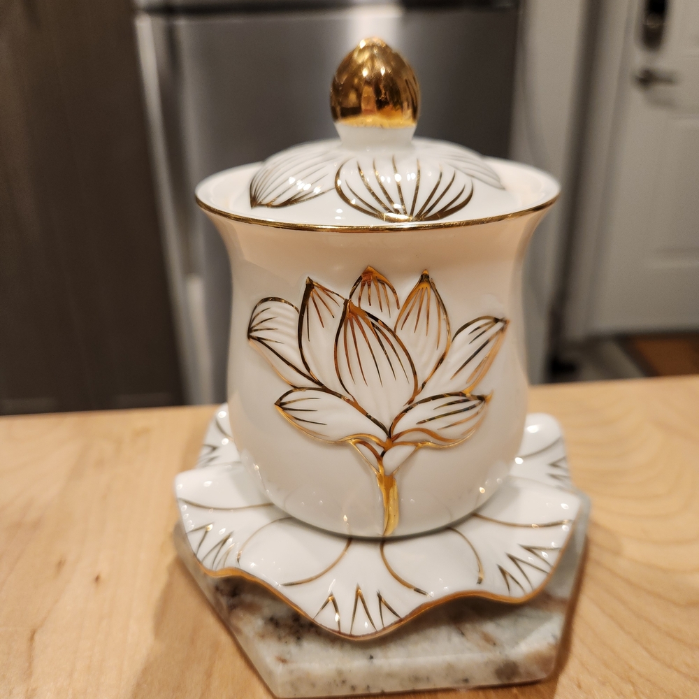 Elegant White and Gold Ceramic Jar with Lid